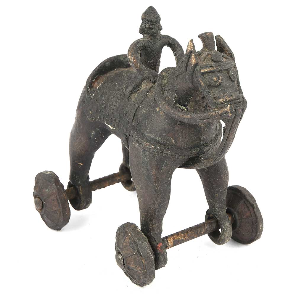 antique toy horse on wheels